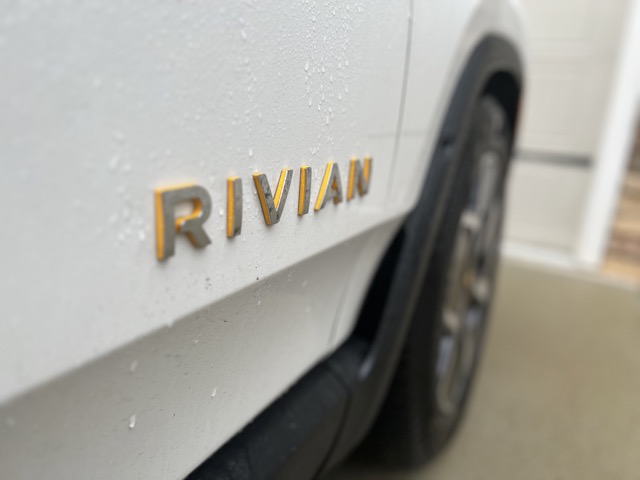 Rivian R1S exterior close up of logo