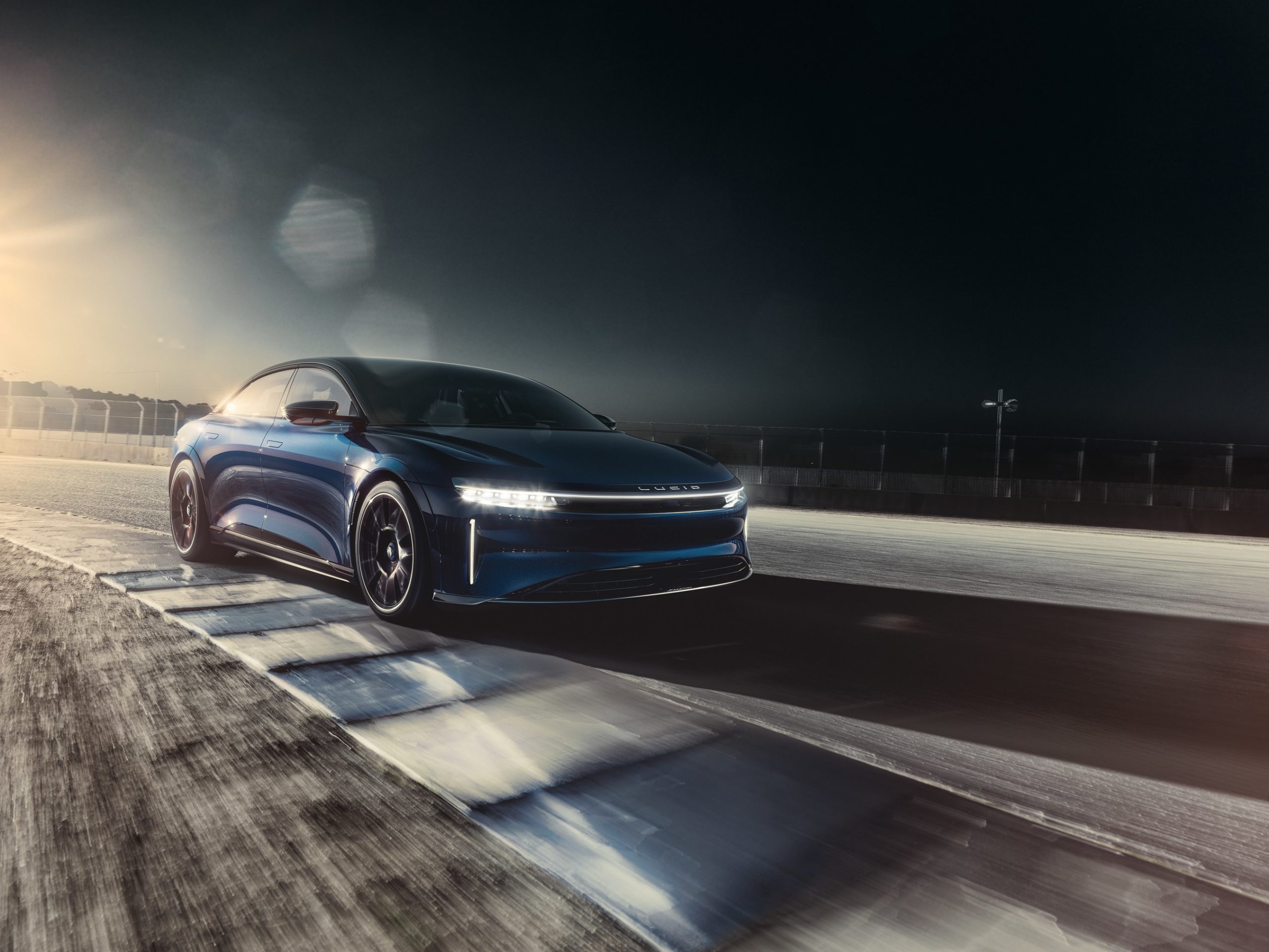 Lucid Air Sapphire driving on a racetrack.